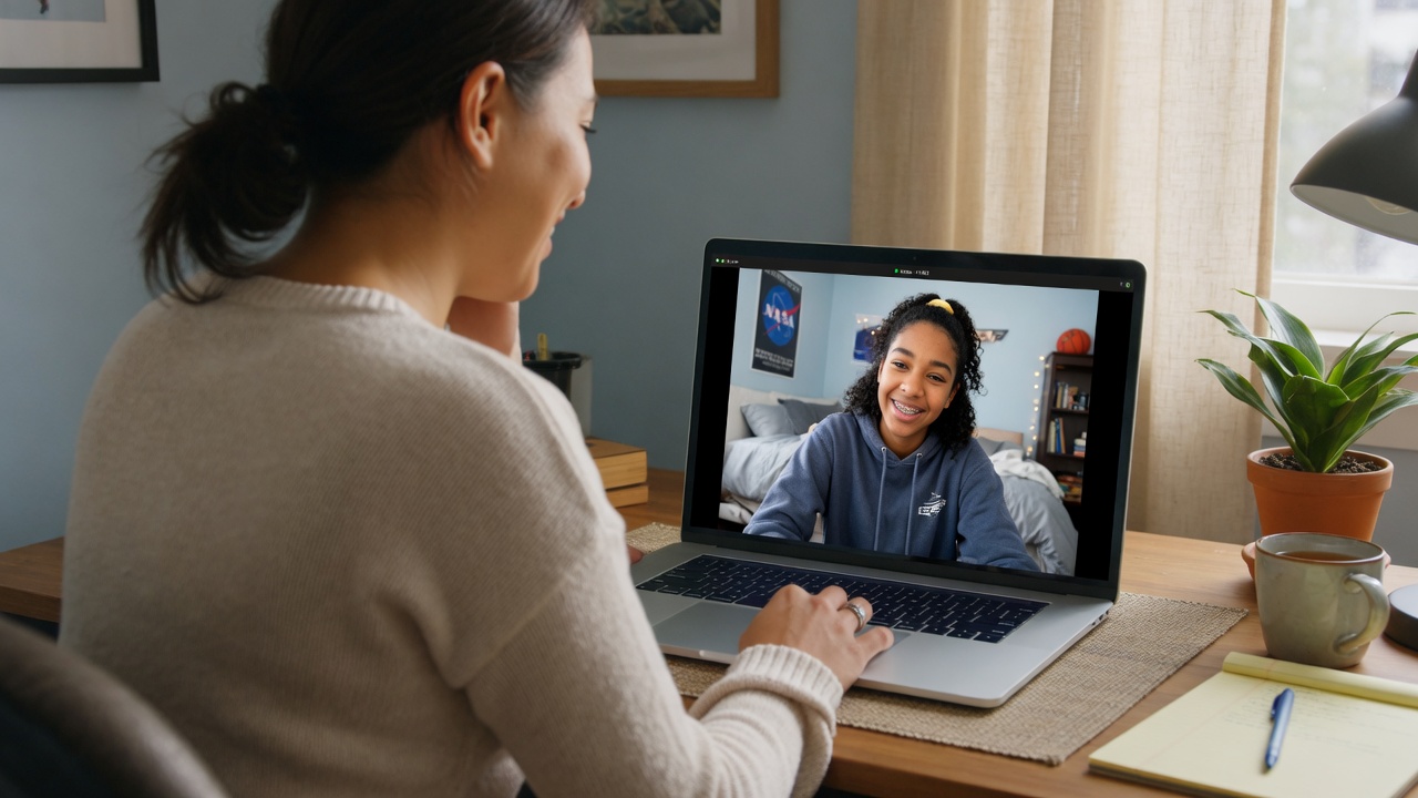 A teacher giving a one-on-one online class to one student